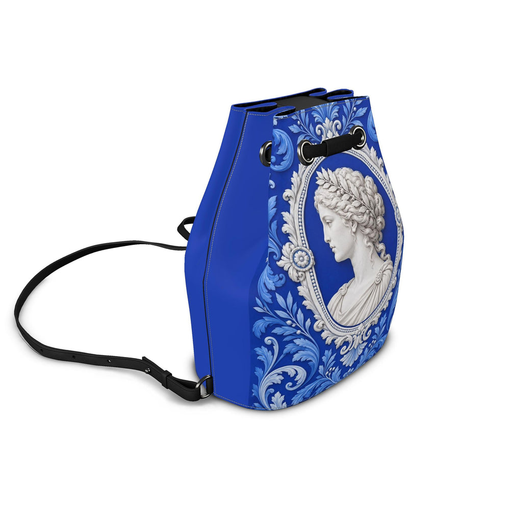 S7 CLASSICA royal-blue drawstring backpack with a white classical cameo portrait, ornate botanical frame, and black cords.