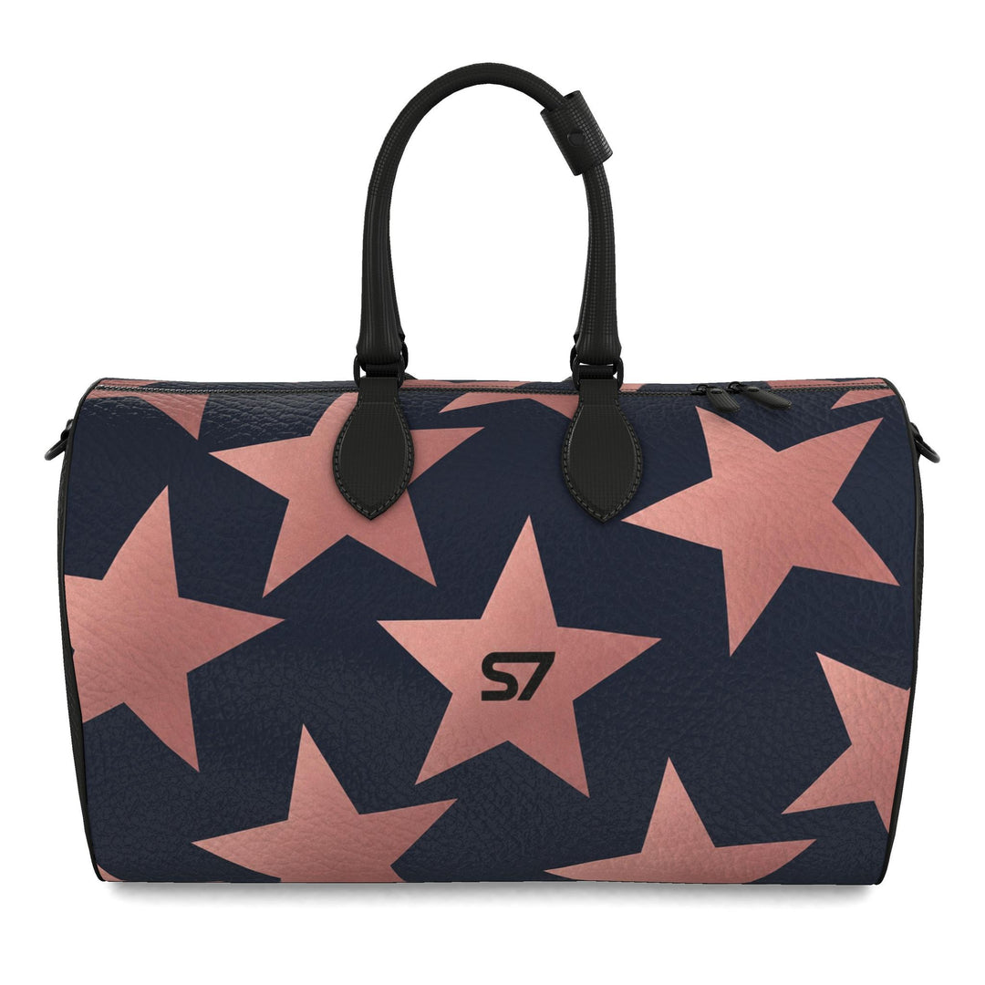 S7 Stella Midnight leather duffle bag with oversized rose-gold stars on midnight blue and a centered black S7 monogram.