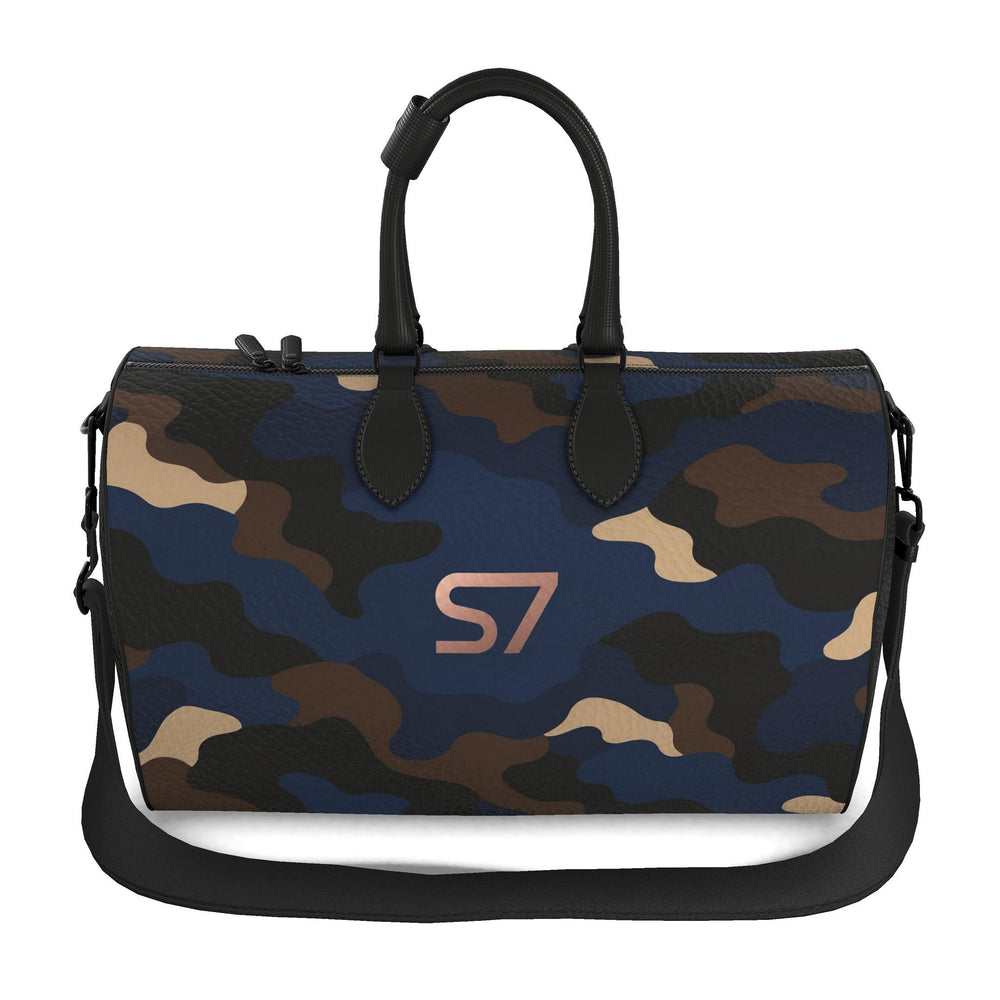 S7 Midnight Terrain leather duffle bag with midnight-blue, navy, beige, brown and black camouflage, a centered rose-gold S7 monogram and black trim.