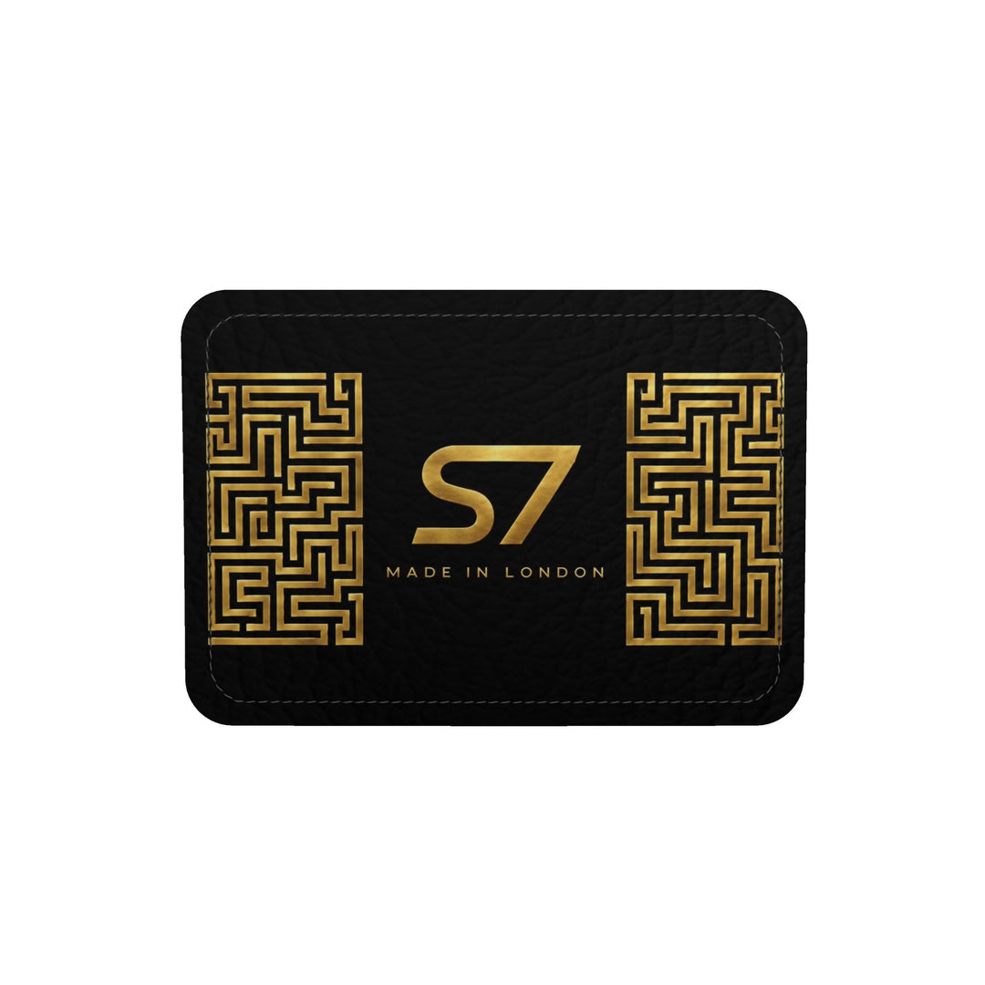 S7 Golden Labyrinth bag featuring antique-gold maze artwork surrounding a centered gold S7 monogram on black.