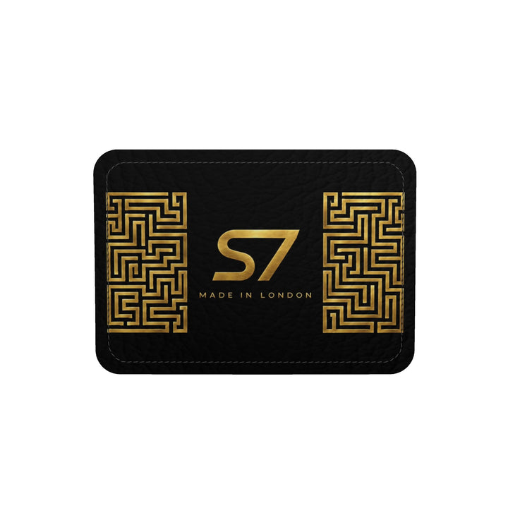 S7 Golden Labyrinth bag featuring antique-gold maze artwork surrounding a centered gold S7 monogram on black.