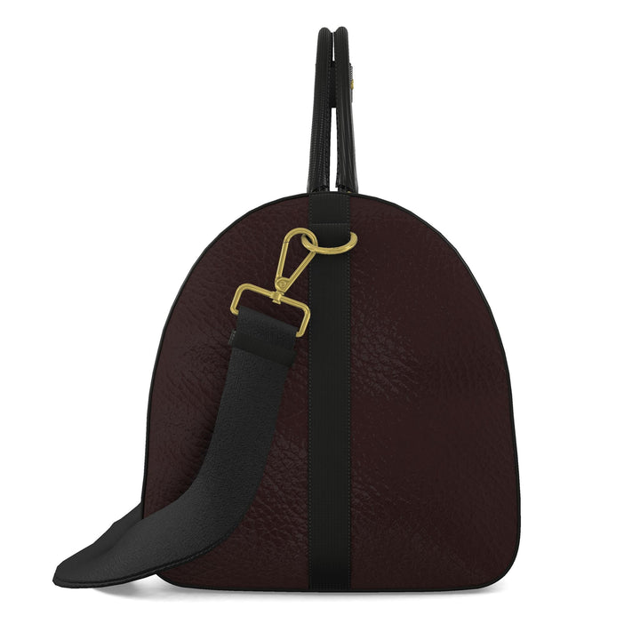 S7 Harlequin Royale Jewel Mosaic leather duffle bag with multicolor diamond print, gold-tone details, burgundy side panels, and black handles.