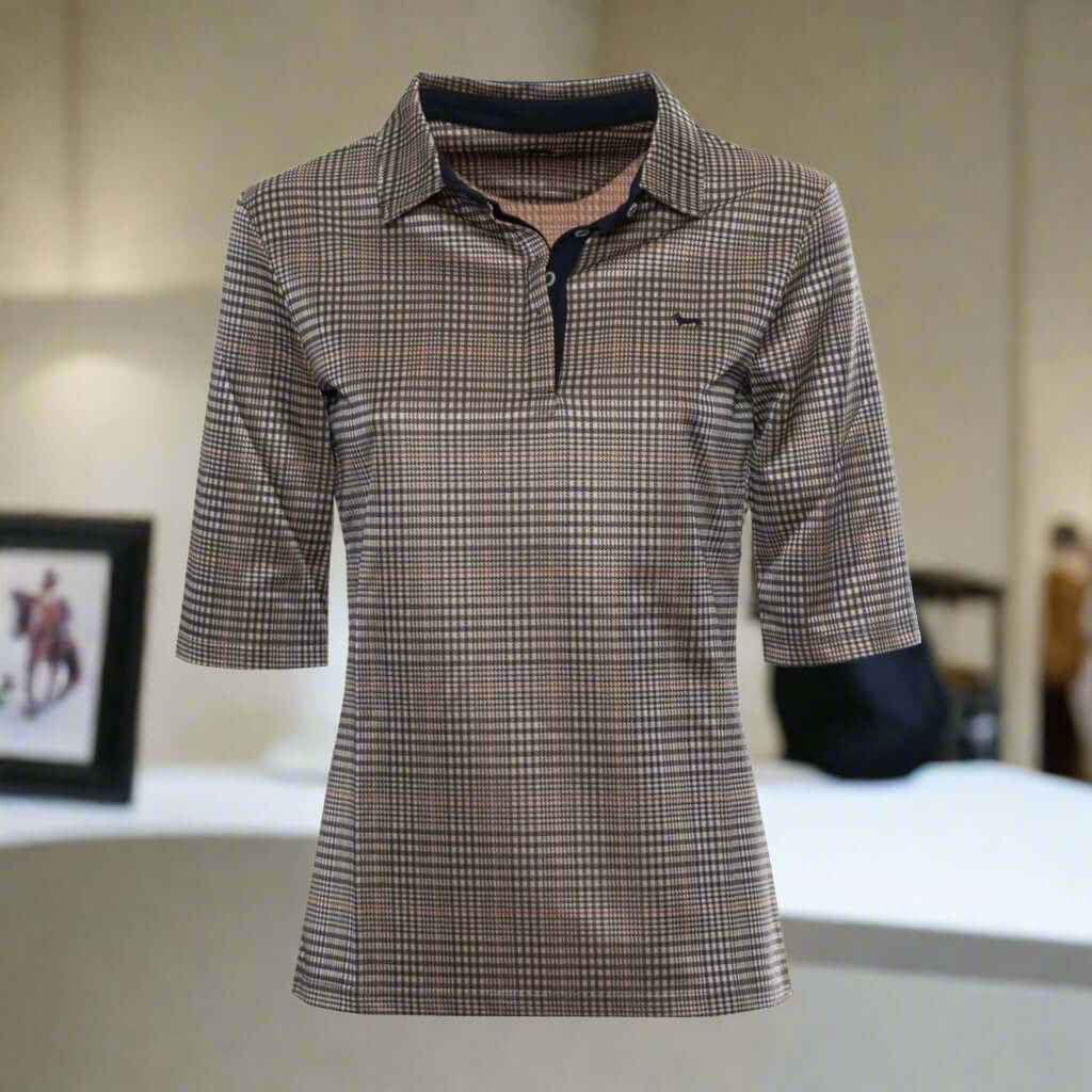 Plaid patterned shirt with a brand logo on a white background