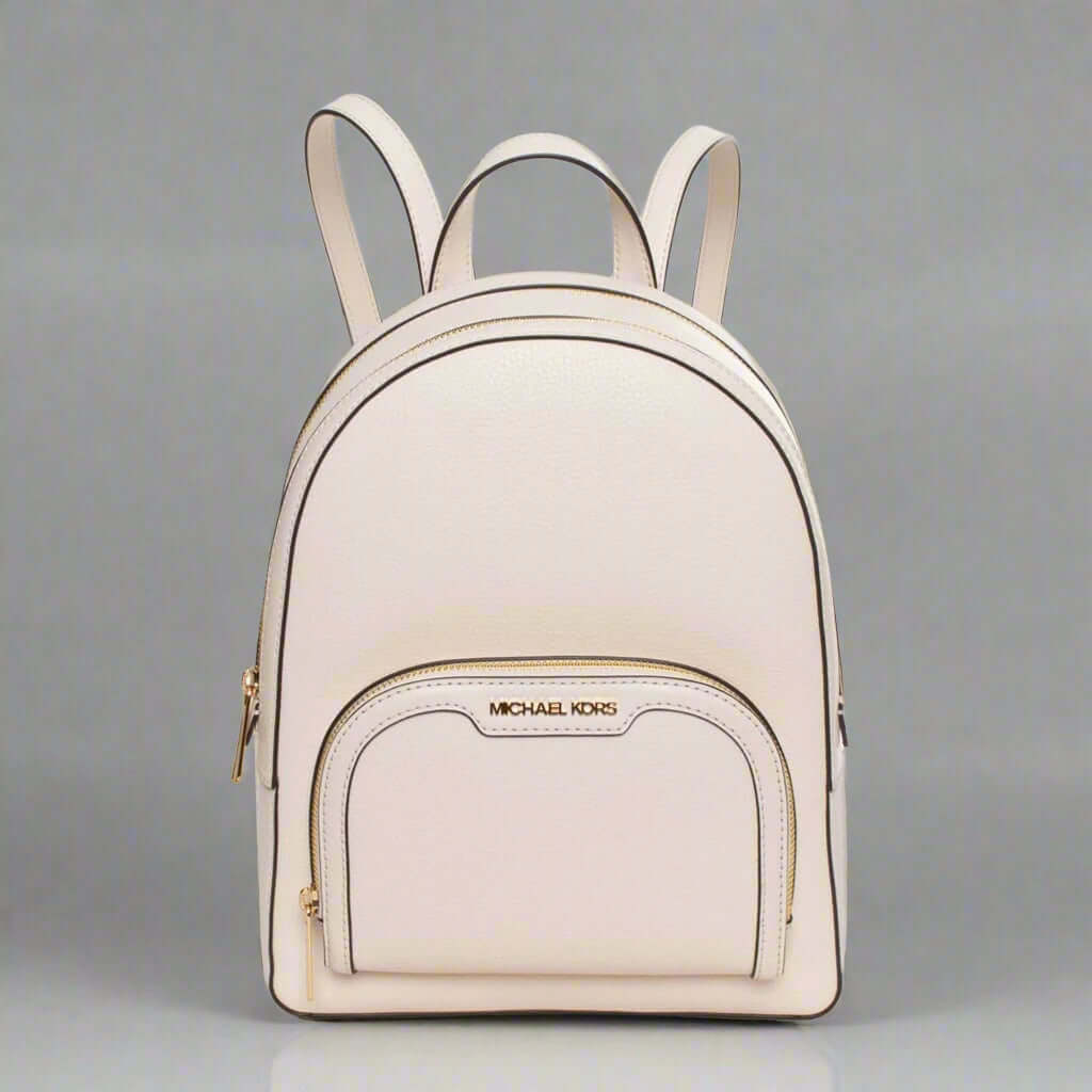 Beige backpack with 'Michael Kors' logo on a white background