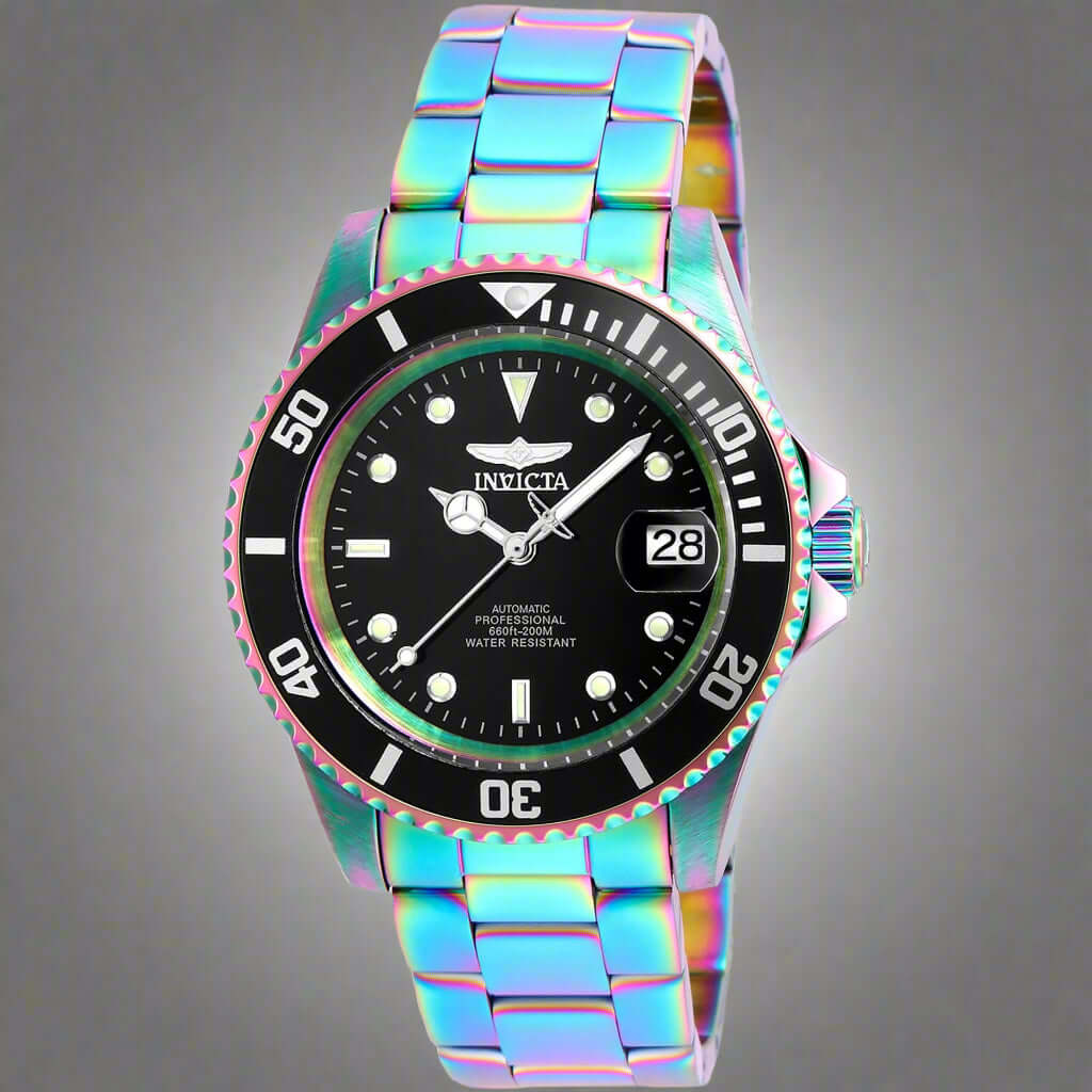 INVICTA Pro Diver men's watch with stainless steel band INVICTA black graphic t-shirt with logo front Gold-tone INVICTA chronograph wristwatch close-up INVICTA men's button-down shirt with embroidered detail INVICTA oversized sport watch and branded appar