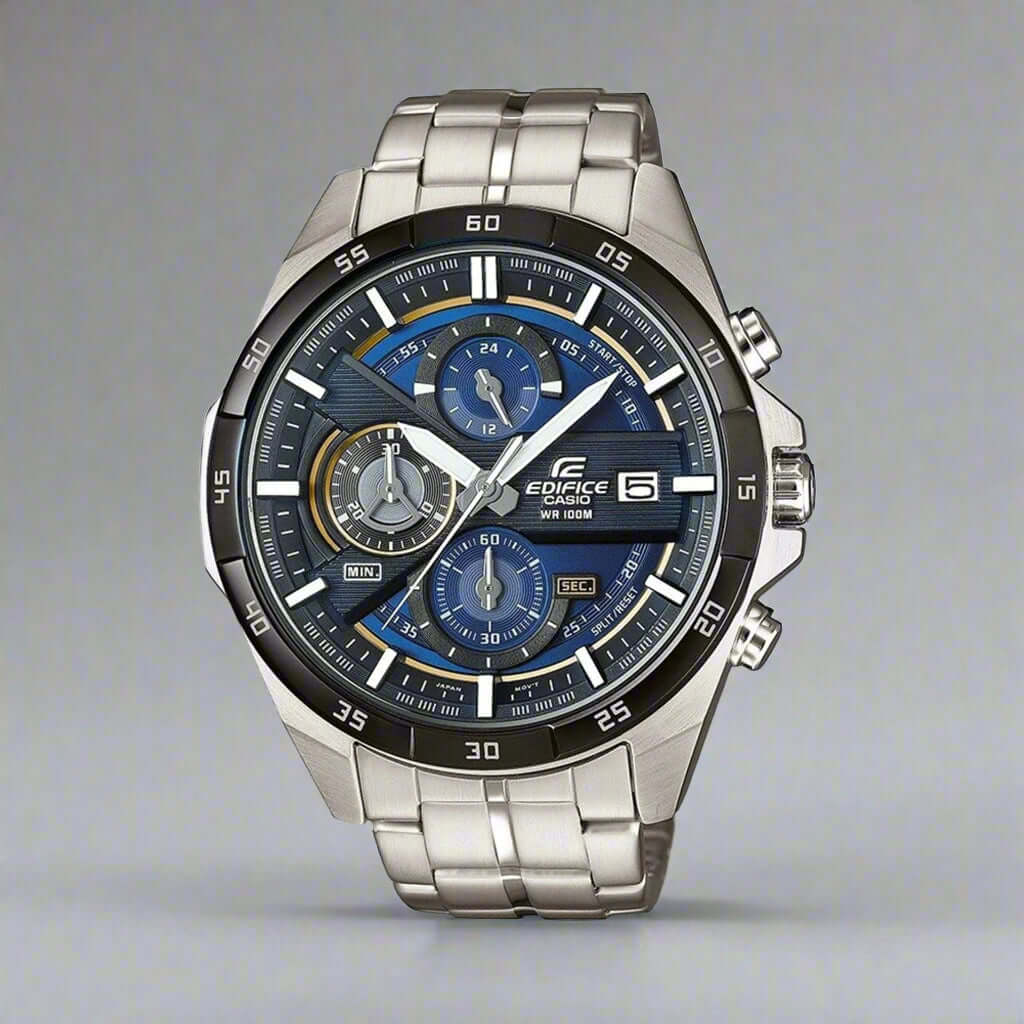 Silver watch with blue face on a white background