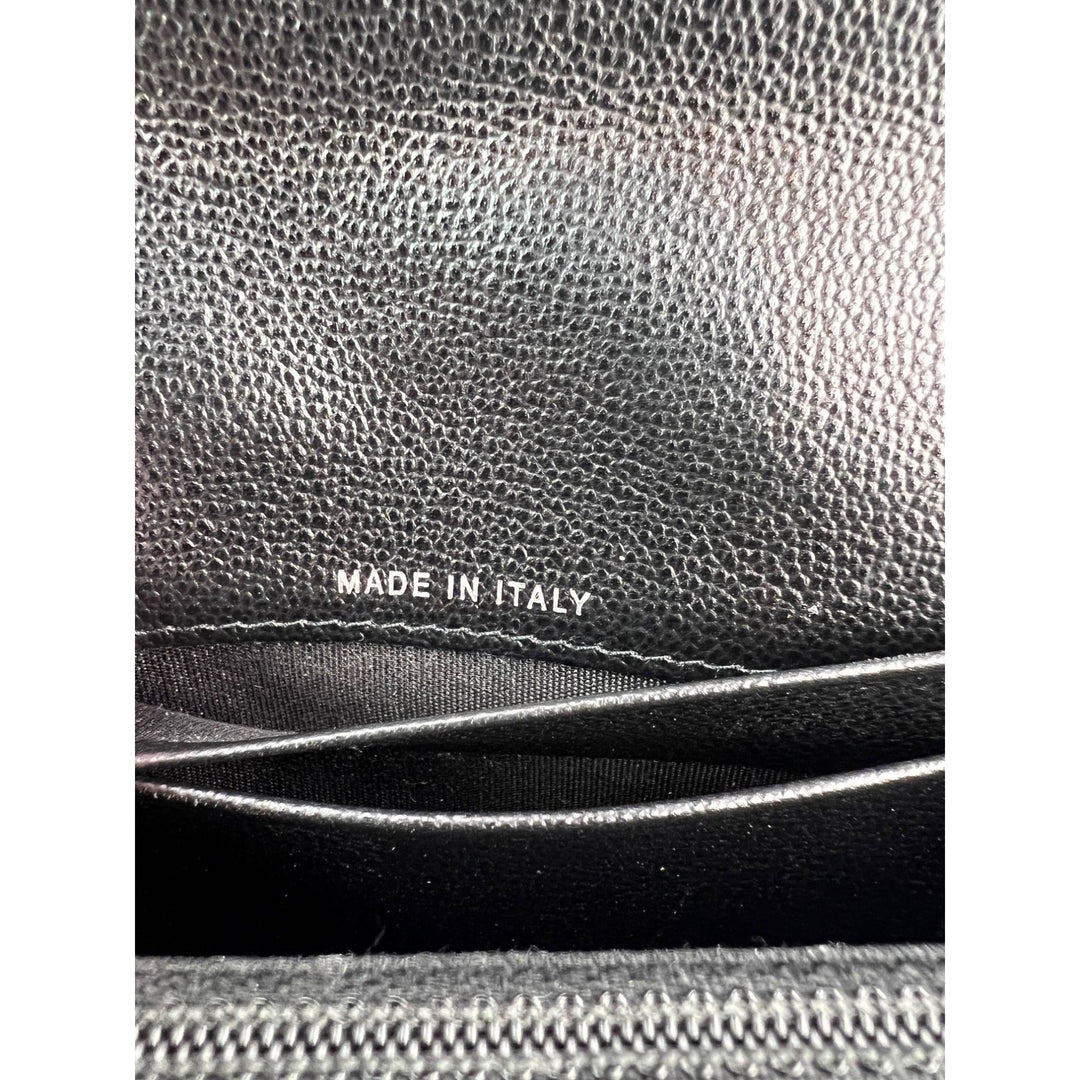 Chanel Grained Calfskin Quilted CC Box Flap Wallet interior showing "MADE IN ITALY" inscription, luxury bags.