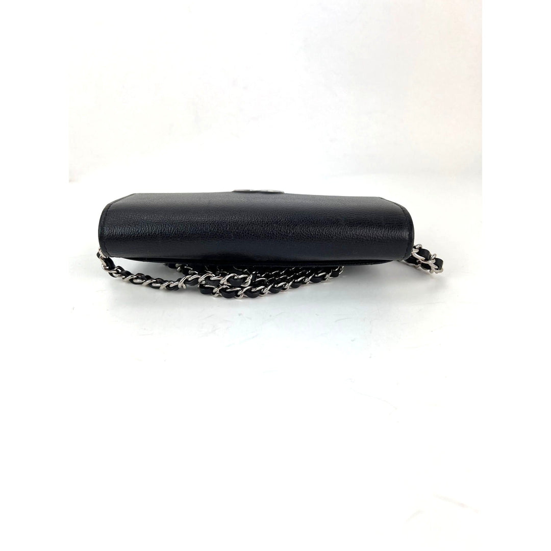Chanel Grained Calfskin Quilted CC Box Flap Wallet with unbranded strap, an elegant luxury bag in black.