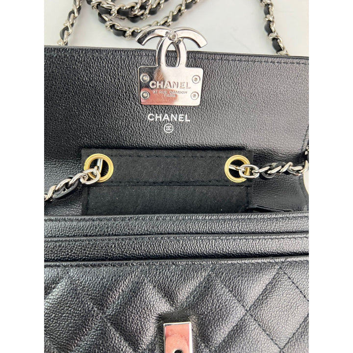 Chanel Grained Calfskin Quilted CC Box Flap Wallet interior view with silver chain and CC push lock closure, luxury bags.