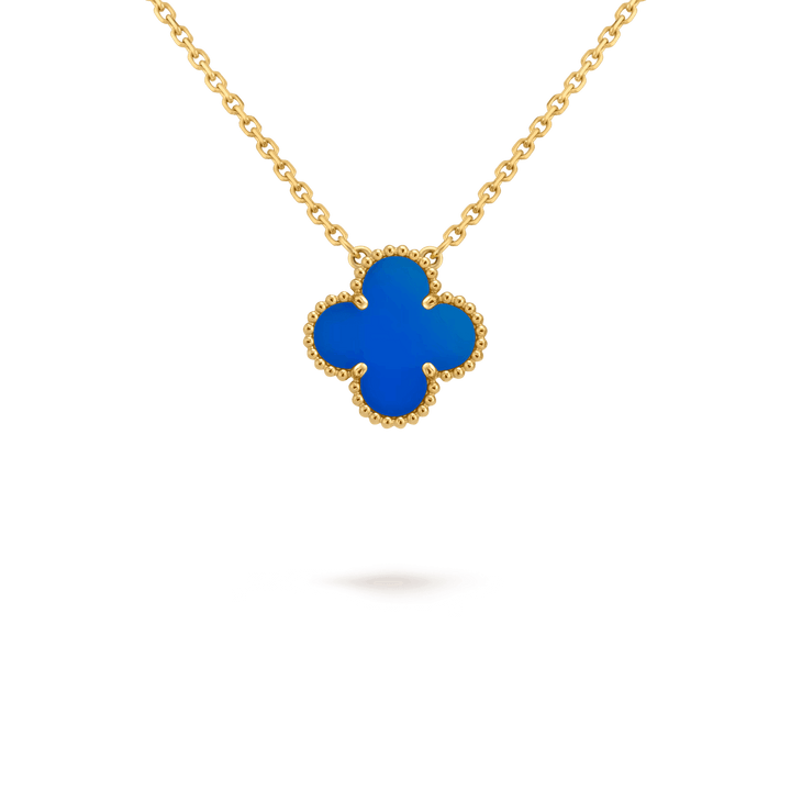 Van Cleef & Arpels Vintage Alhambra pendant 18K yellow gold, Agate on a gold chain showcasing fine jewelry.