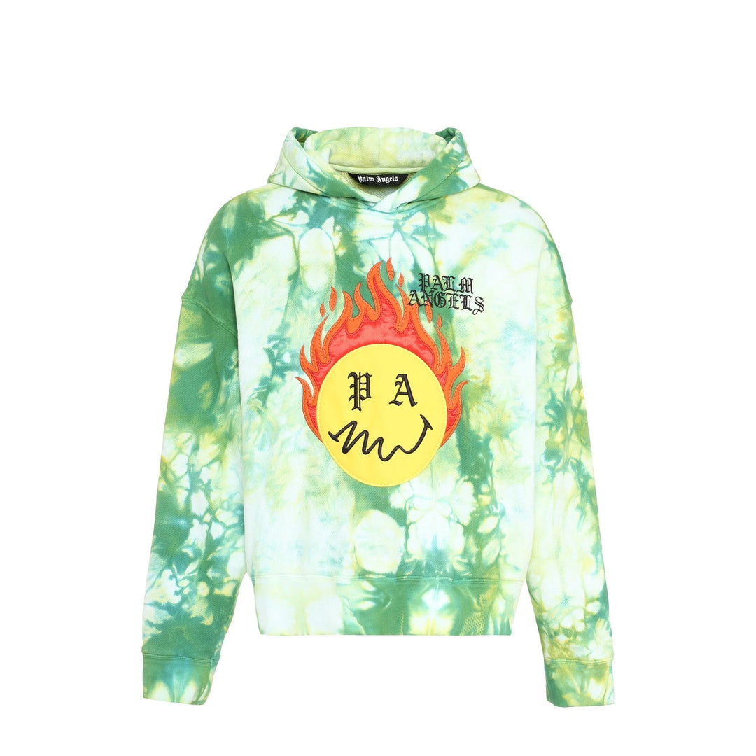 Tie-dye hoodie with flame design and 'Palm Angels' logo on a white background