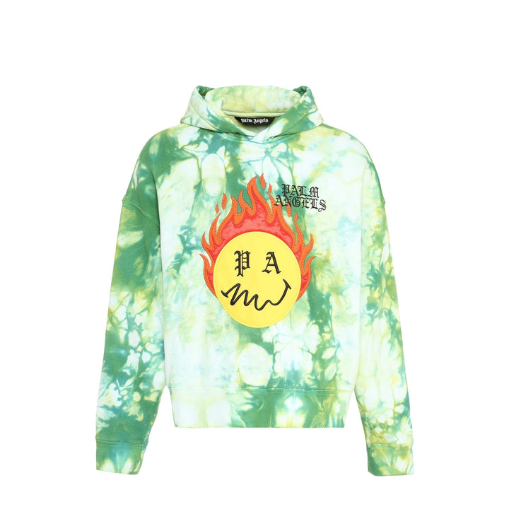Tie-dye hoodie with flame design and 'Palm Angels' logo on a white background