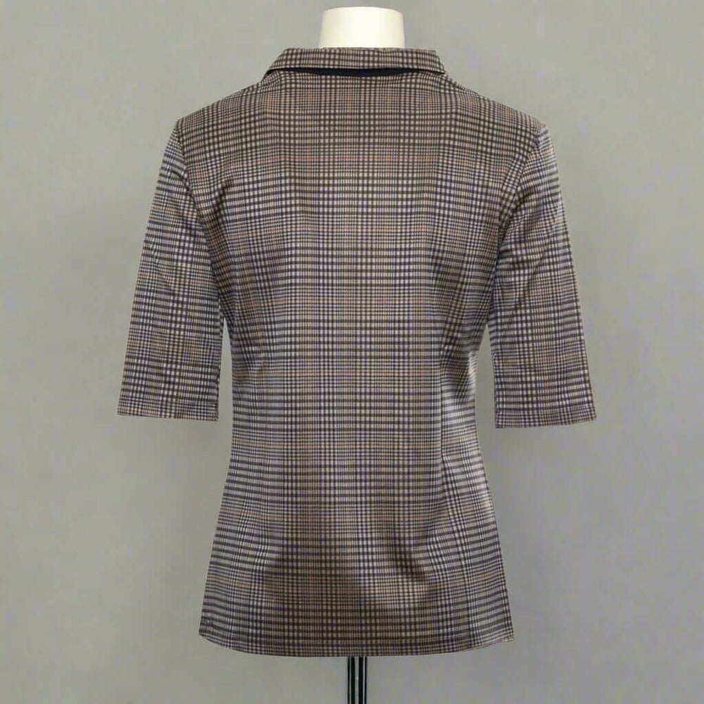 Plaid patterned shirt with short sleeves on a white background