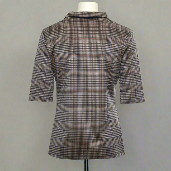 Plaid patterned shirt with short sleeves on a white background