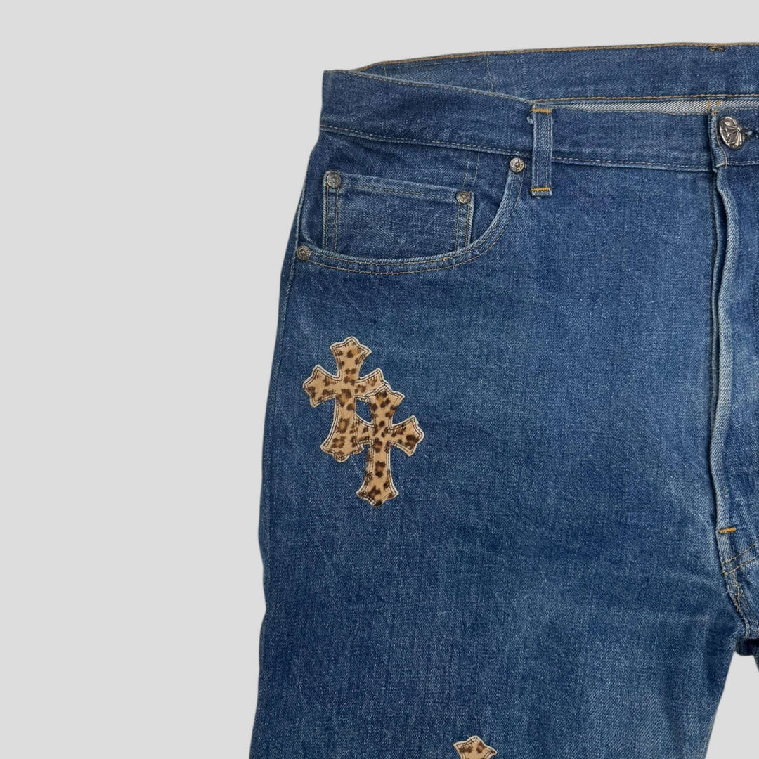 Chrome Hearts Levis Cross Patch Jeans featuring a unique leopard print cross patch on dark indigo denim.