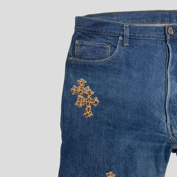 Chrome Hearts Levis Cross Patch Jeans featuring a unique leopard print cross patch on dark indigo denim.