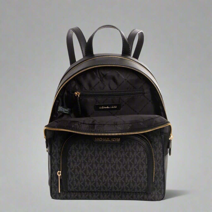 Black backpack with gold zippers and logo on a white background