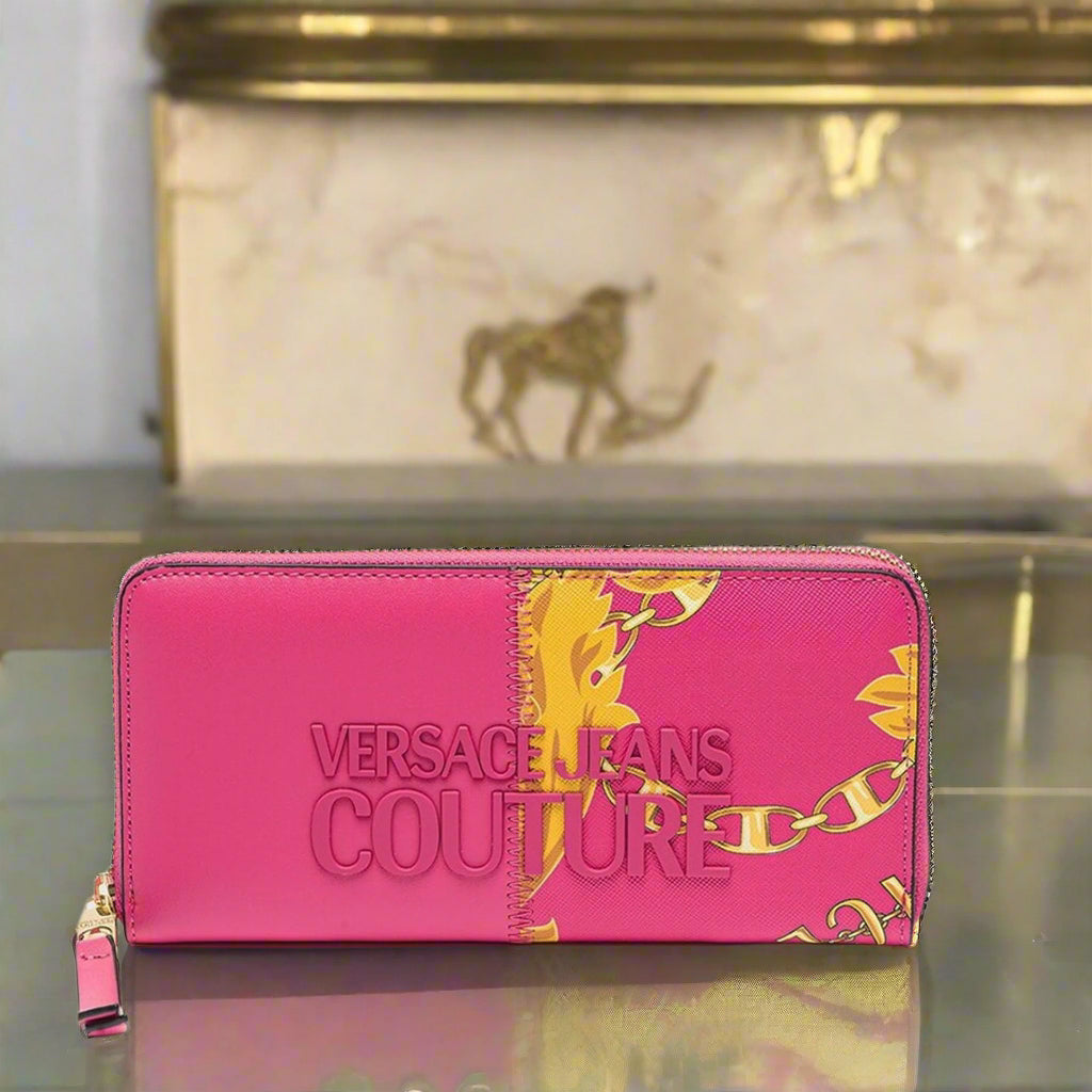 Versace Jeans Couture women's wallet in pink, featuring gold emblem and synthetic material, zip fastening, stylish and chic.