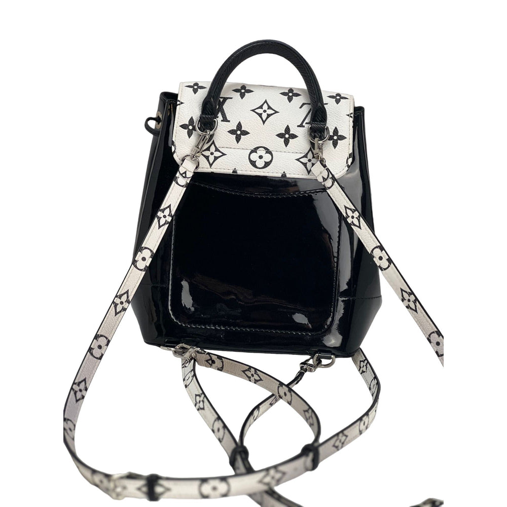 LOUIS VUITTON Hot Springs Backpack White Monogram and Patent Leather, stylish luxury bags with black accents.