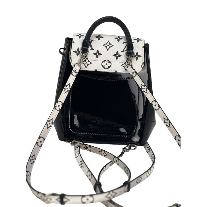 LOUIS VUITTON Hot Springs Backpack White Monogram and Patent Leather, stylish luxury bags with black accents.