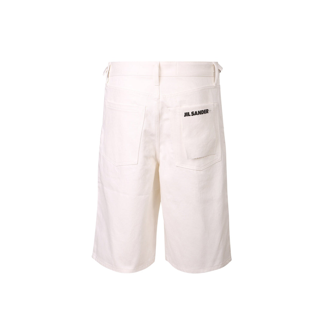 White pants with 'Jil Sander' branding on a white background