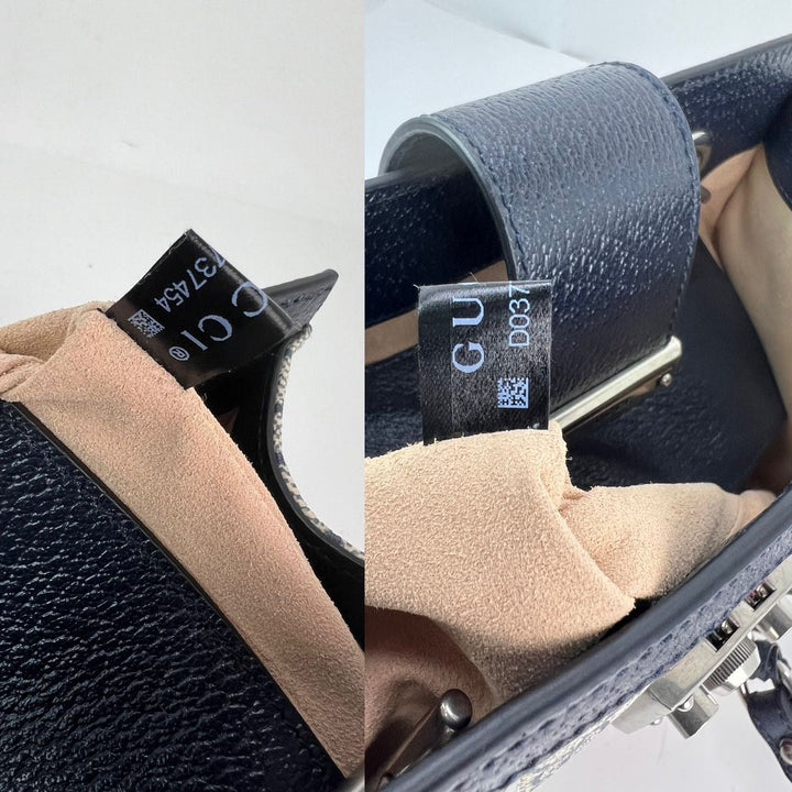 Inside view of Gucci GG Supreme Dollar Calfskin Web Small Padlock Navy Tote, showcasing interior lining and authenticity label.