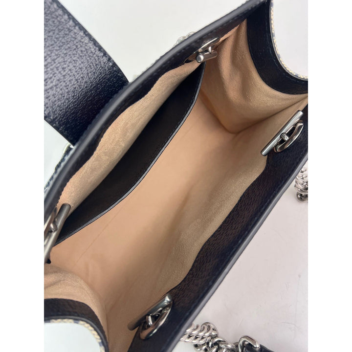 Interior view of Gucci GG Supreme Dollar Calfskin Web Small Padlock Navy Tote showcasing tan lining and silver hardware.
