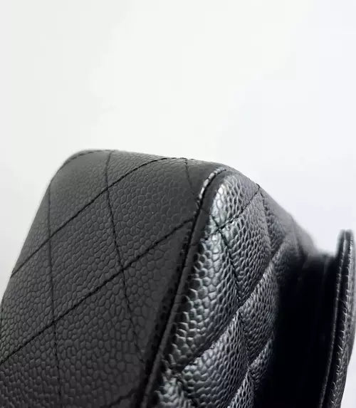 Preloved CHANEL classic quilted handbag front view Authentic CHANEL black leather flap bag CHANEL gold chain shoulder bag – preloved Vintage CHANEL logo clutch purse Secondhand CHANEL luxury tote with dust bag