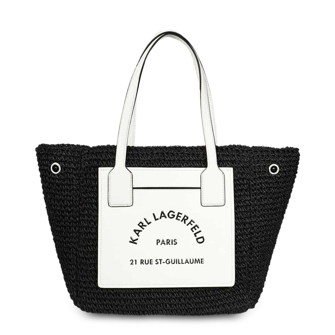 A black and white Karl Lagerfeld shopping bag with two handles, a visible logo, and a text label.