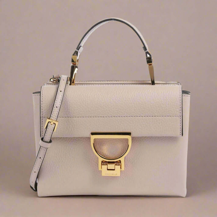 Coccinelle beige leather buckled Crossbody Bags
