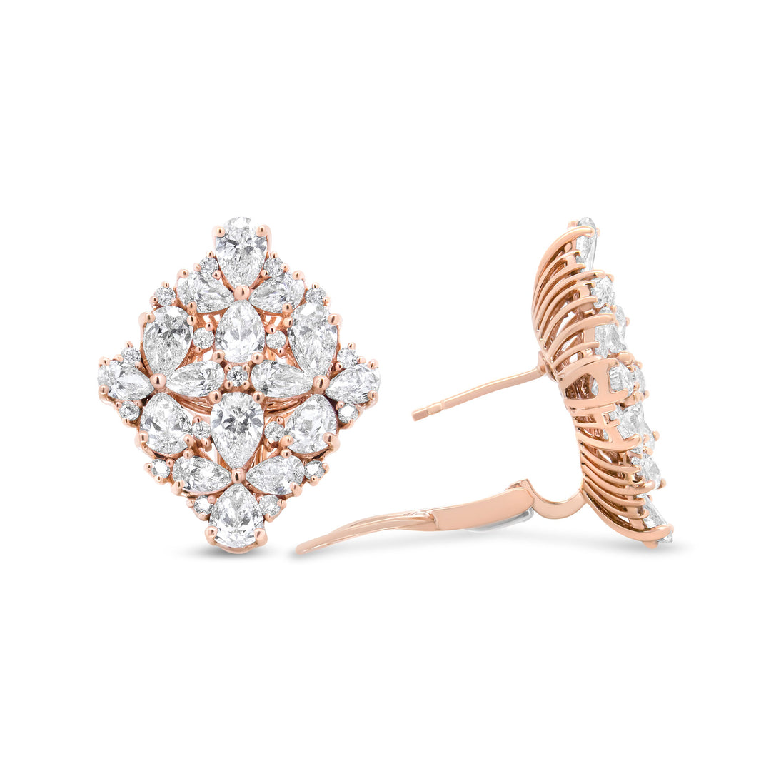 Rose gold earrings with clear gemstones on a white background