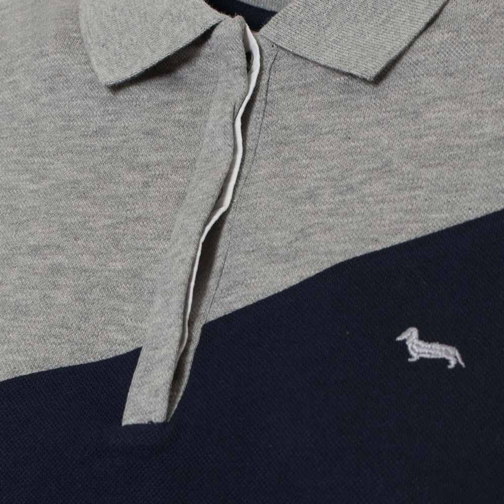Gray and navy polo shirt with a small logo on the chest.
