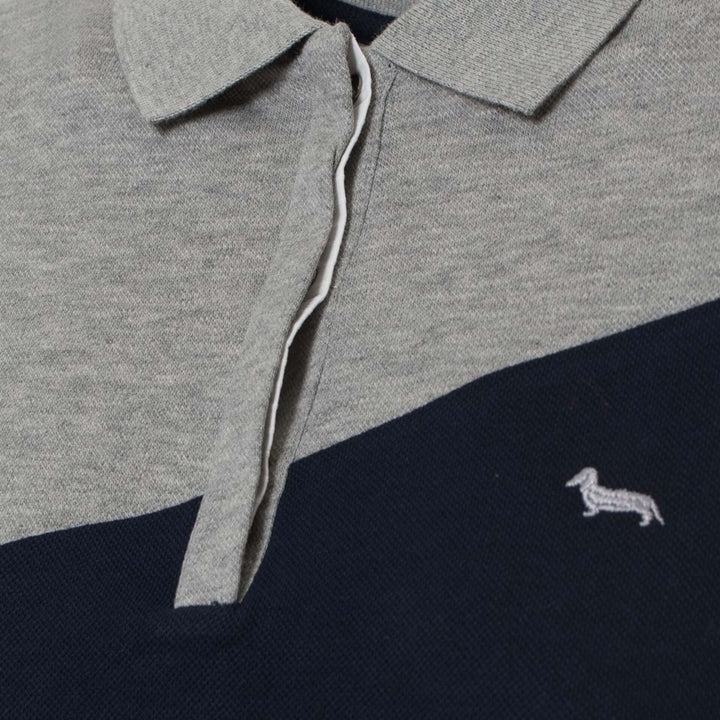Gray and navy polo shirt with a small logo on the chest.