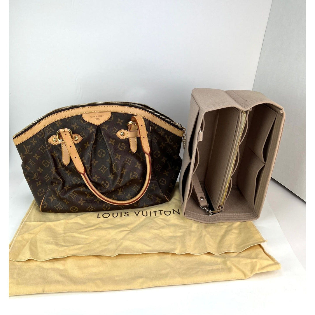 Louis Vuitton handbag with monogram pattern and matching pouch on a white background