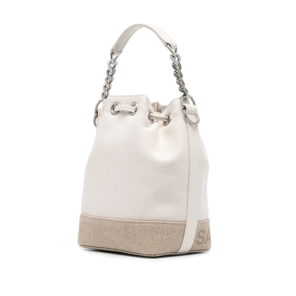 White bucket bag with beige base and chain handle on a white background