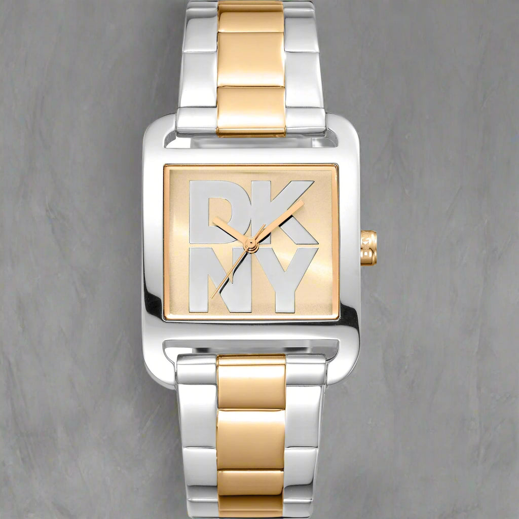 DKNY women's gold tone dial with silver center logo Watches