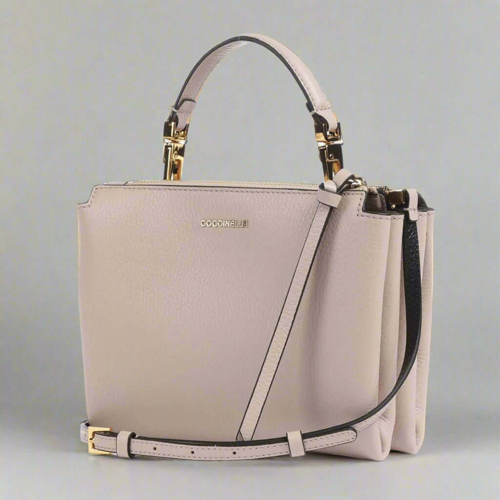 Coccinelle beige leather buckled Crossbody Bags