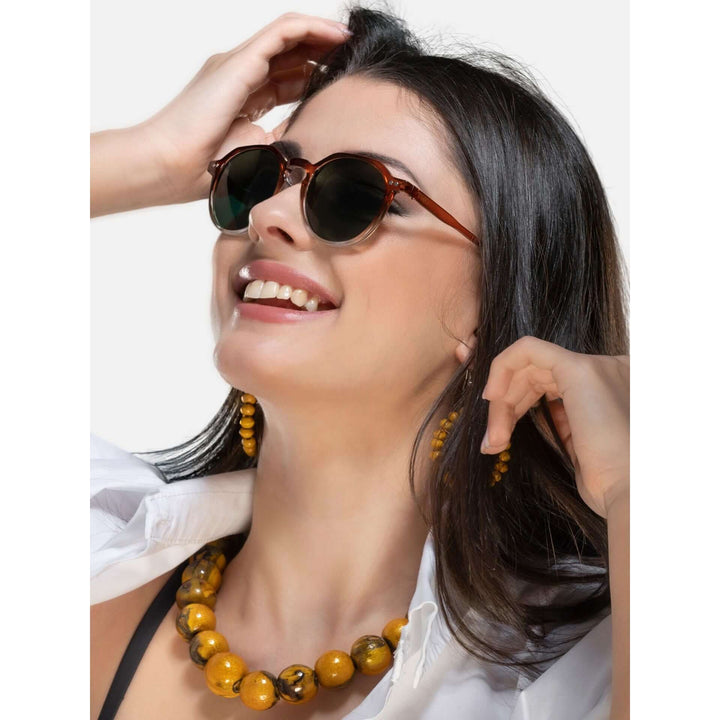 Twig men's and women's sunglasses in assorted styles including aviator, round, and square frames