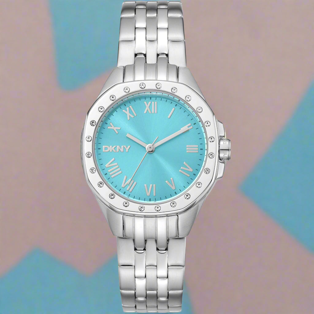 DKNY women's blue dial jeweled bezel Watches