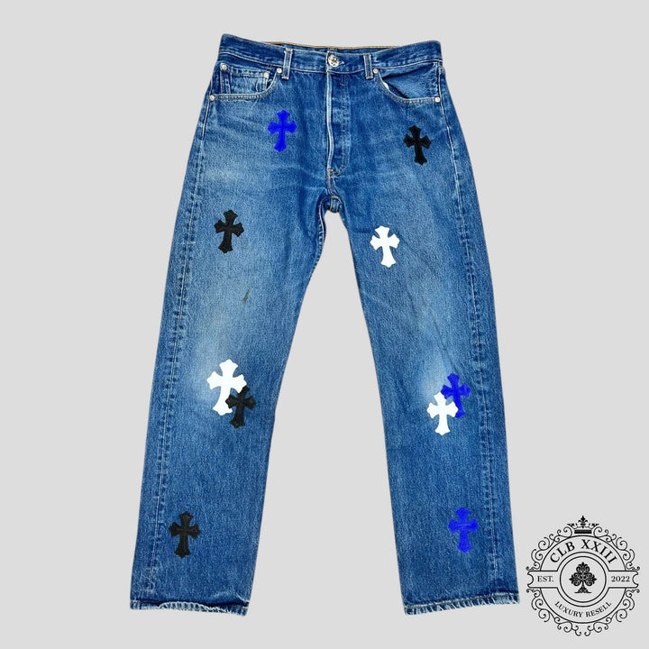 Chrome Hearts Levi Patch Jeans in Black/Blue/White featuring iconic cross patches, rare luxury denim jeans for collectors.