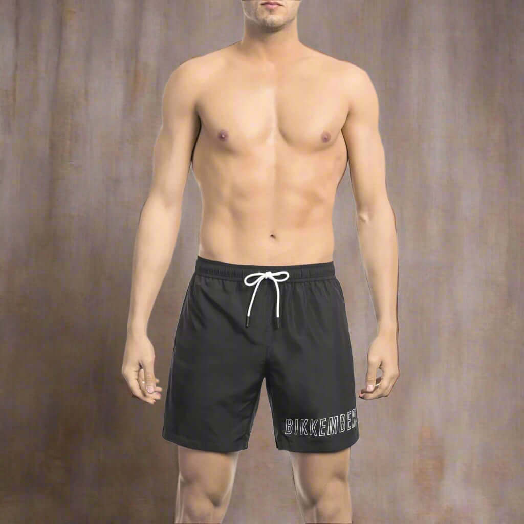 Men’s Bikkembergs beachwear and swimwear collection at STORE 7994 featuring modern swim trunks and sporty beach styles for summer.