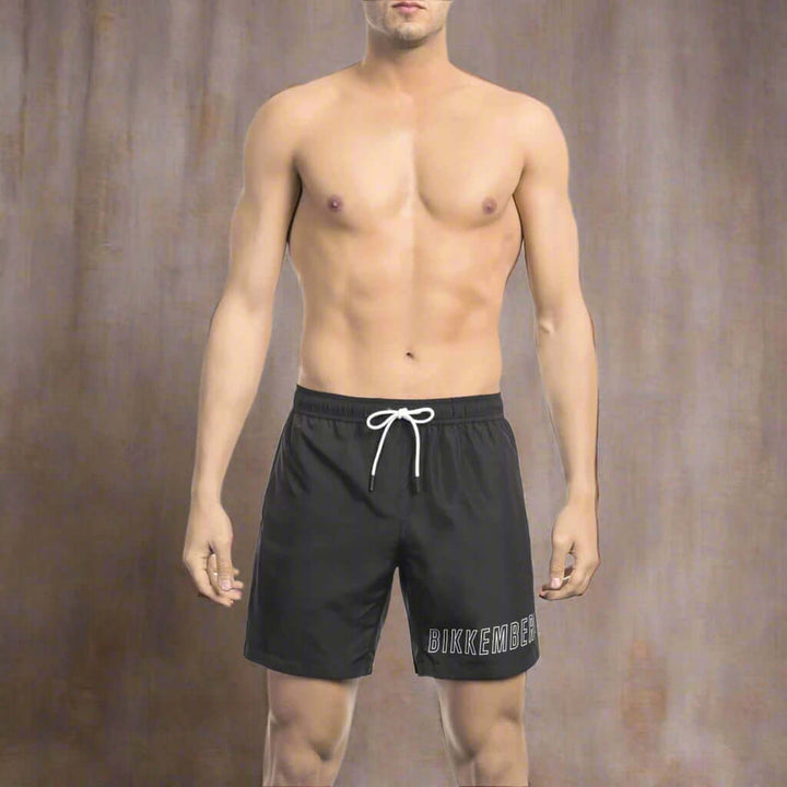 Men’s Bikkembergs beachwear and swimwear collection at STORE 7994 featuring modern swim trunks and sporty beach styles for summer.