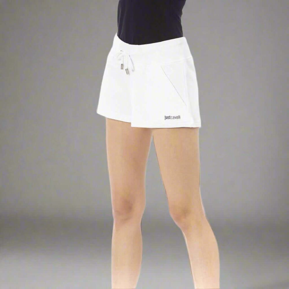 White athletic skirt worn by a person on a white background