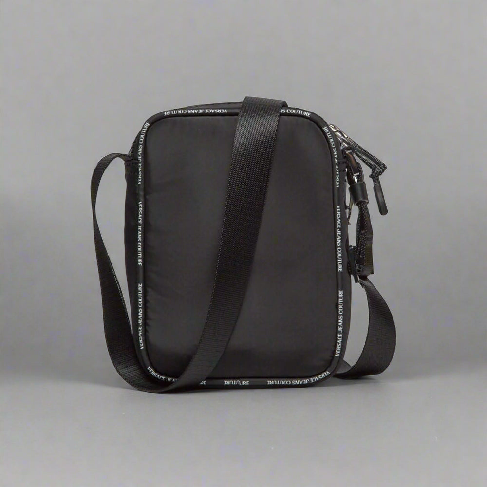 Versace Jeans Couture men's crossbody bag with adjustable strap and visible logo in sleek black synthetic material.