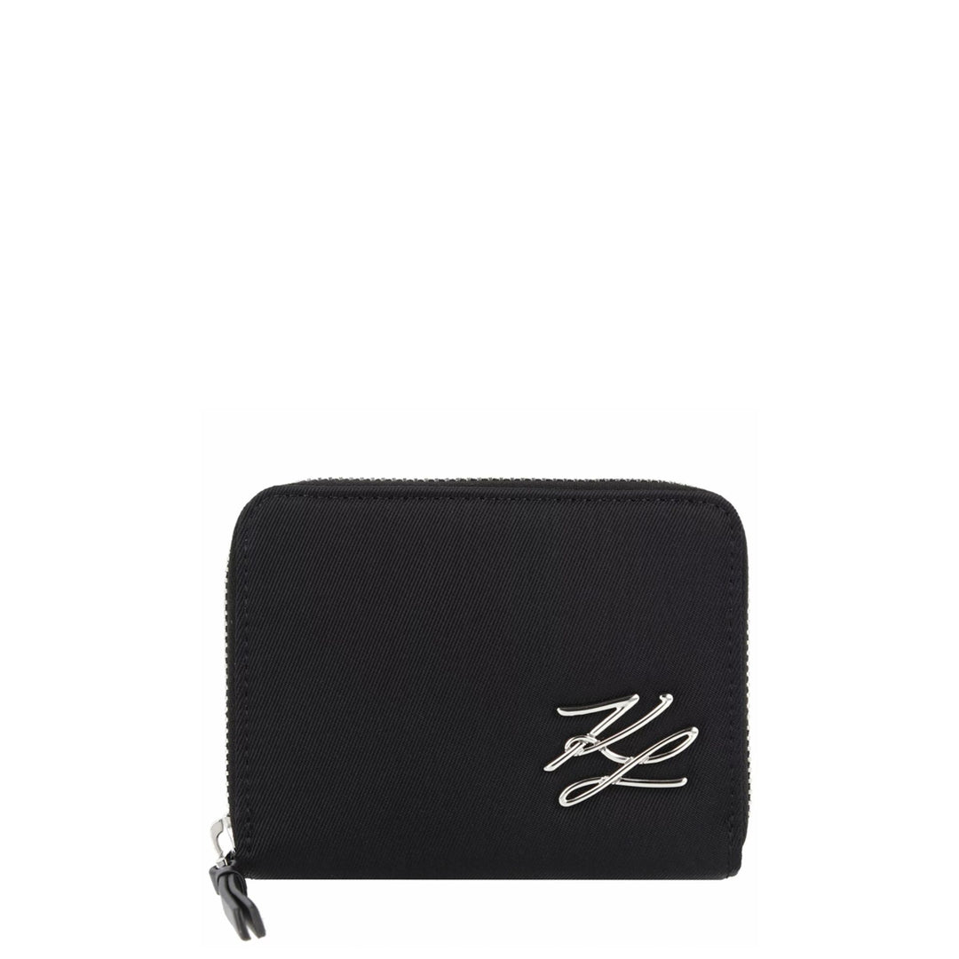 Black faux leather Karl Lagerfeld wallet with a silver embossed logo, closed with a zip.