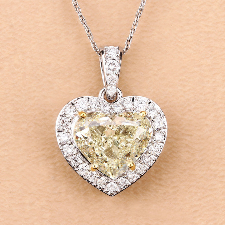 IGI Certified 4.51 Carat Genuine Light Yellow Diamond Center and 0.45cttw White Diamond 18K White Gold Pendant (4.96cttw)