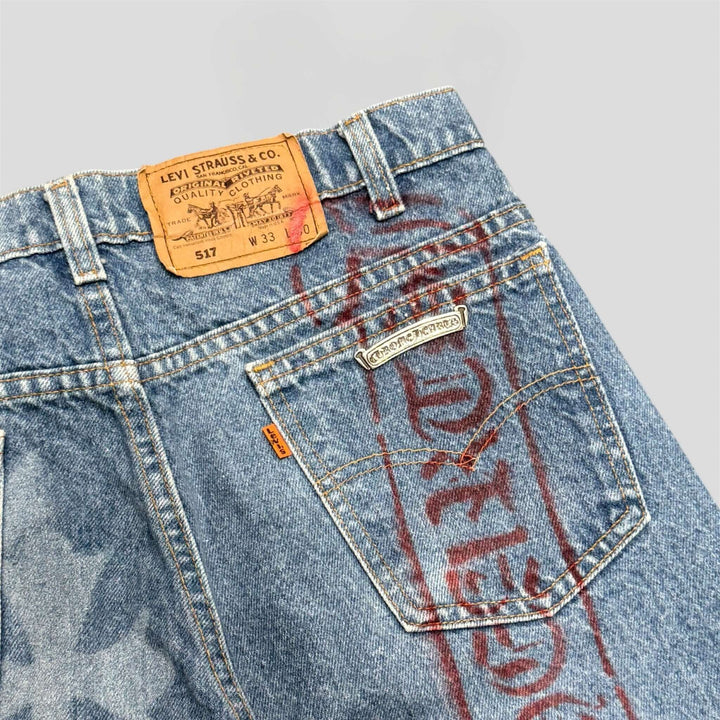 Chrome Hearts Stencil Jeans in flawless blue condition, featuring authentic cross patch and luxury design.