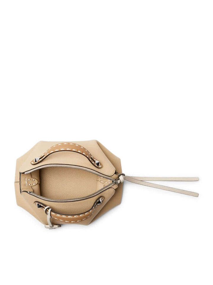 Beige handbag with a strap on a white background