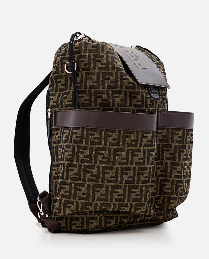 Brown patterned backpack with brown accents on a white background