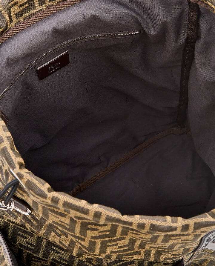 Open bag showing interior with a patterned fabric exterior